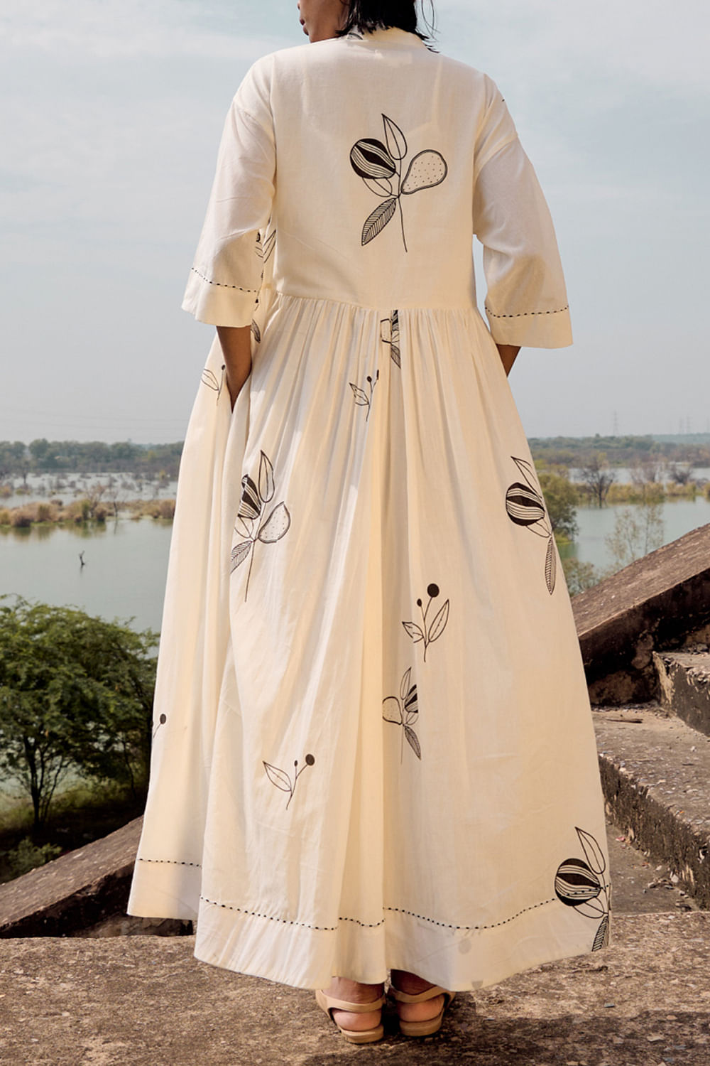 Buy Black and off white fruit print maxi dress by Khara Kapas at