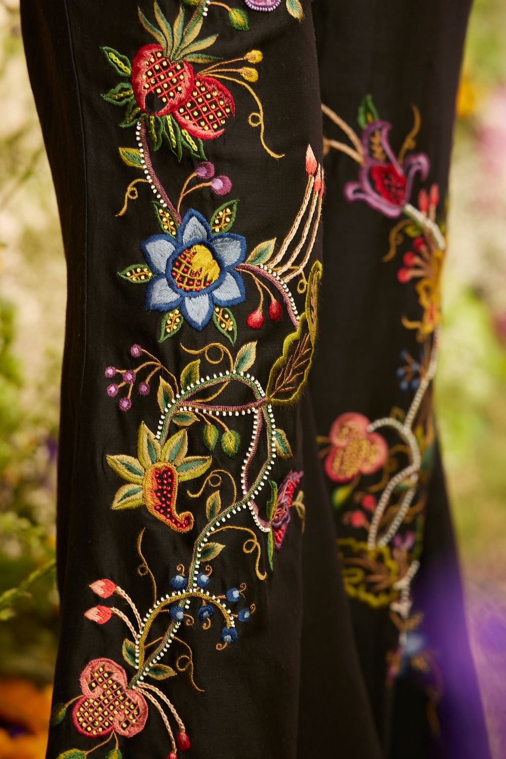 Embroidered bell bottom trousers outlet