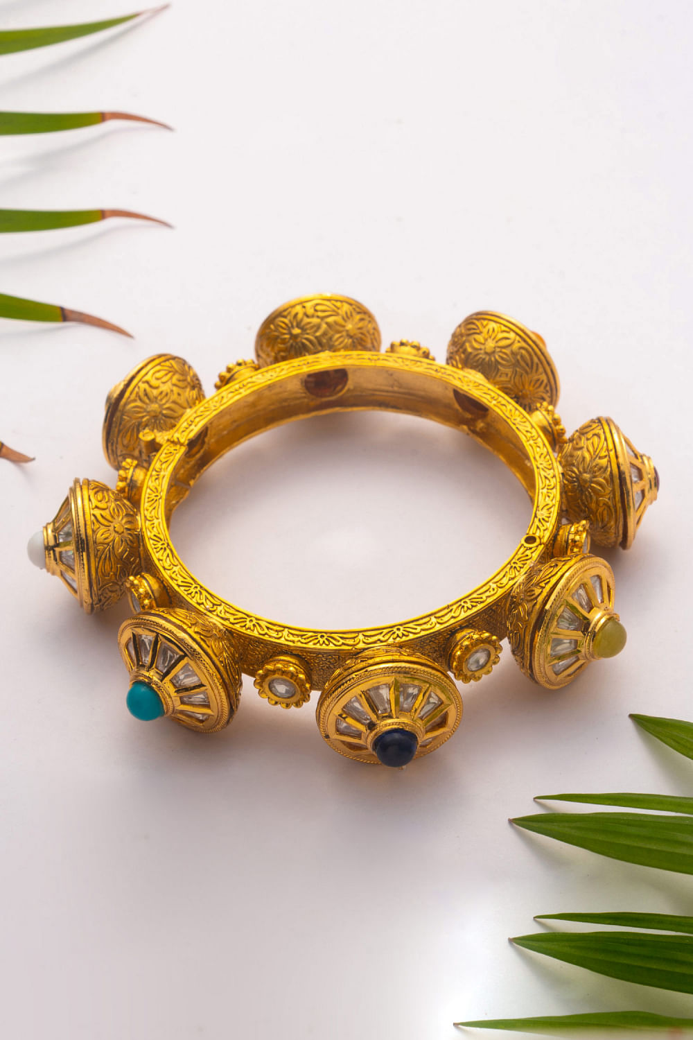 Buy Gold embellished kundan navaratna kada by Zevar By Geeta at