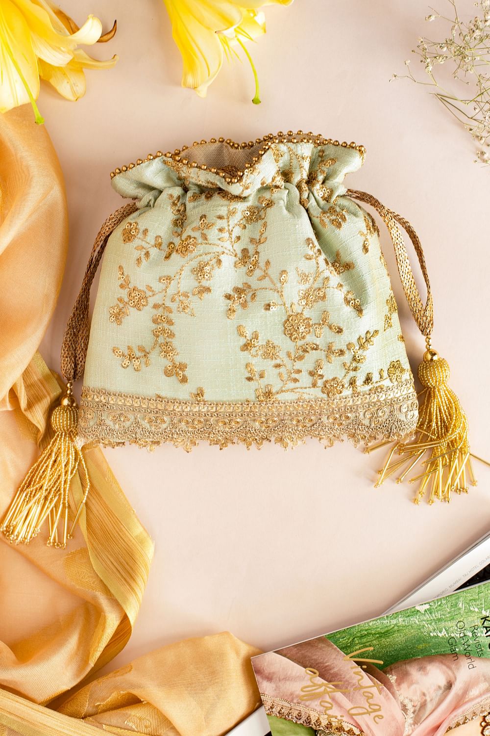 Mint flroal embroidered potli bag