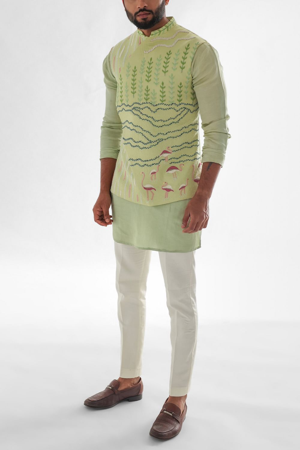 Buy Mint green thread and cutdana embroidered asymmetric Nehru