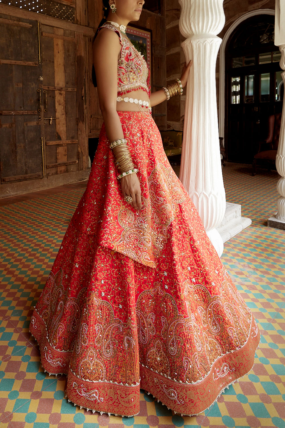 Buy Red pearl and resham embroidered jamawar lehenga set by Aditi