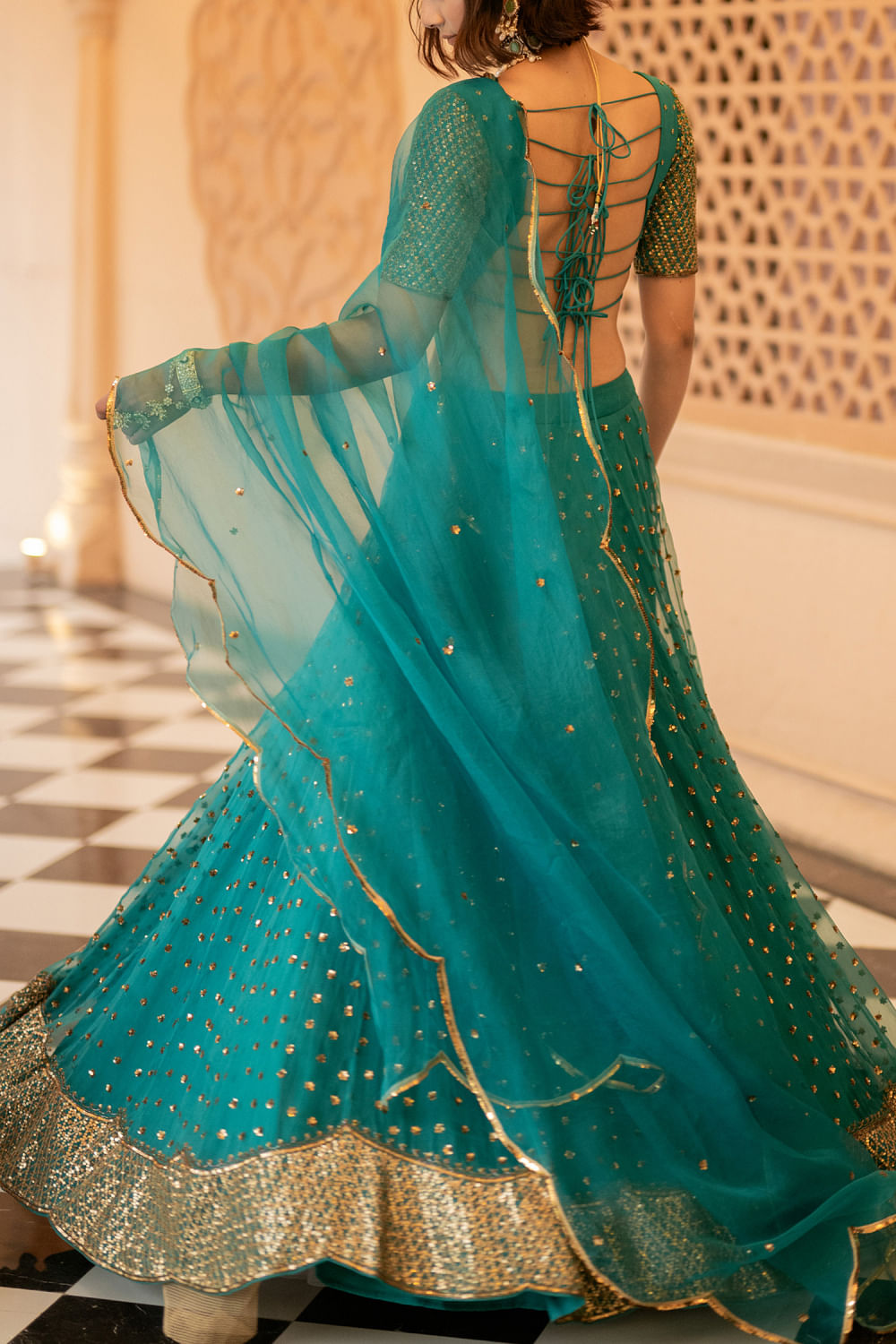 Buy Green sequin embellished tiered lehenga set by Chamee and Palak at  Aashni and Co