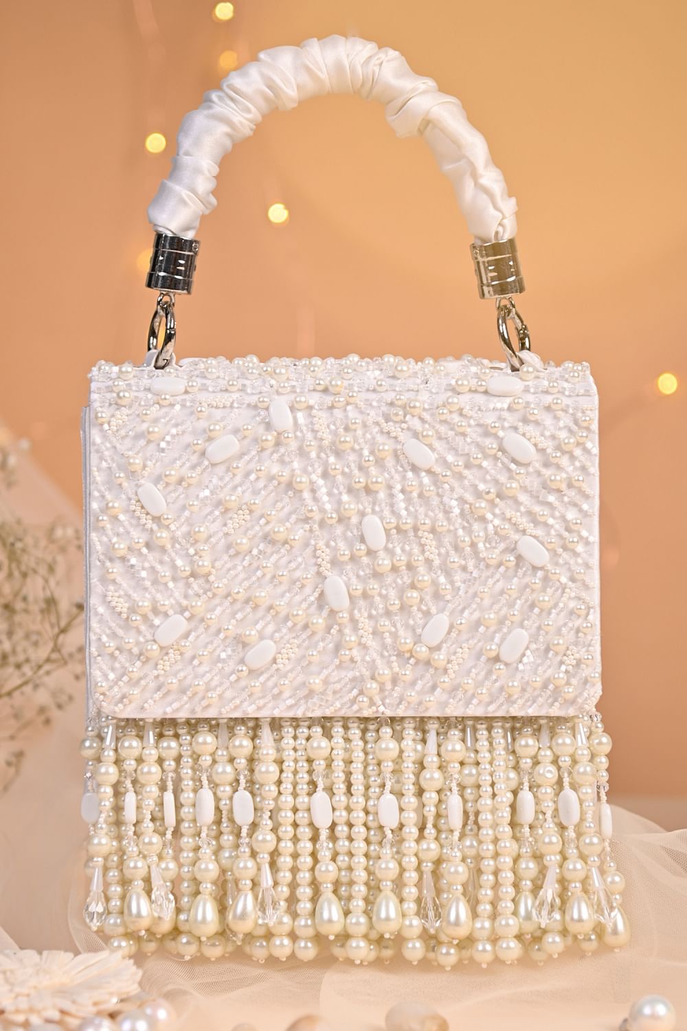 White embellished clutch bag