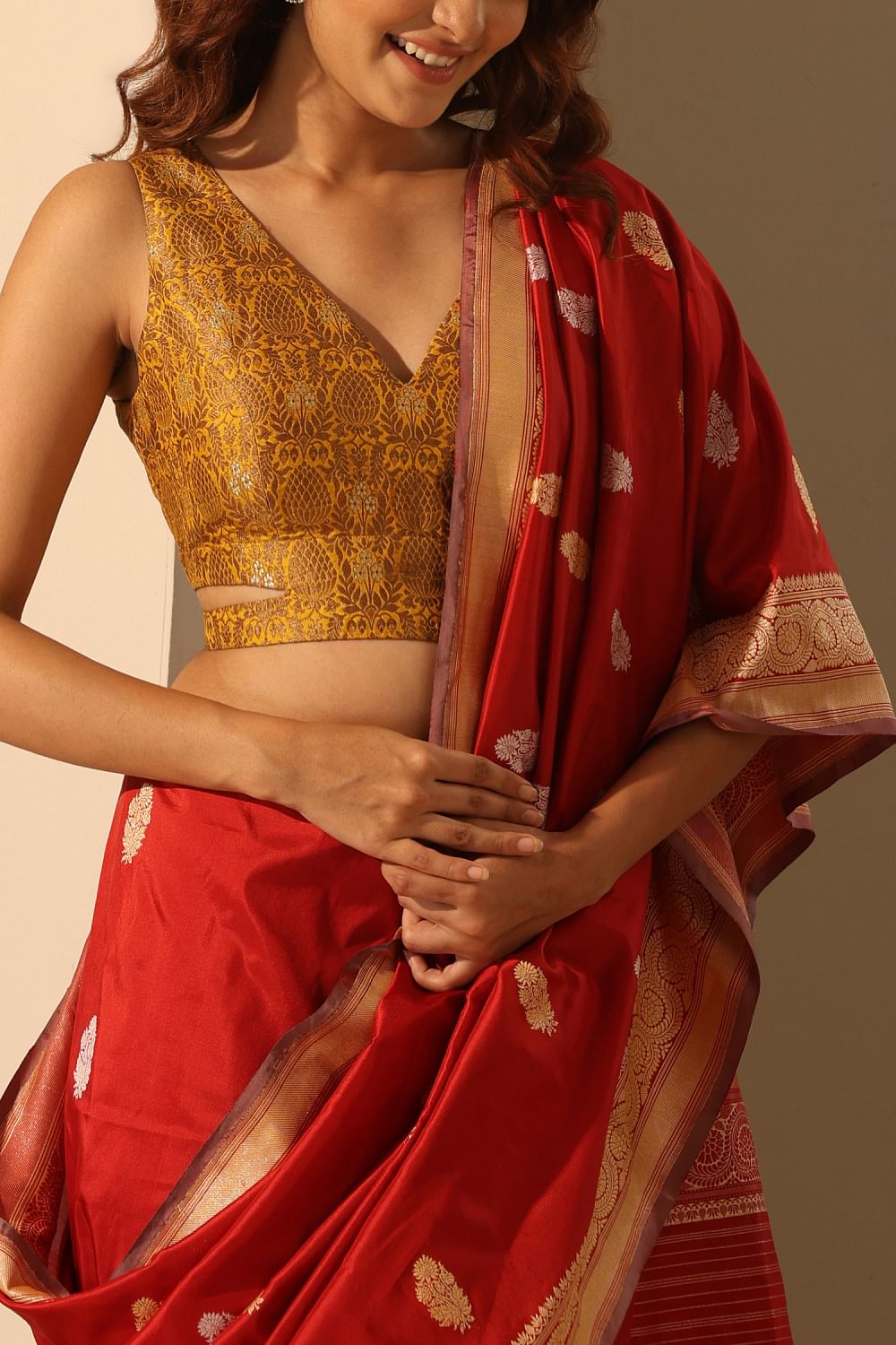 Yellow brocade sleeveless blouse