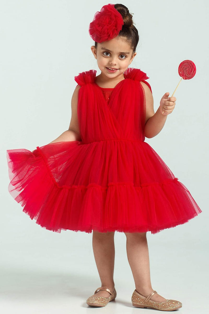 Red tulle dress and hair clip designed by FreeSparrow at AASHNI+CO.