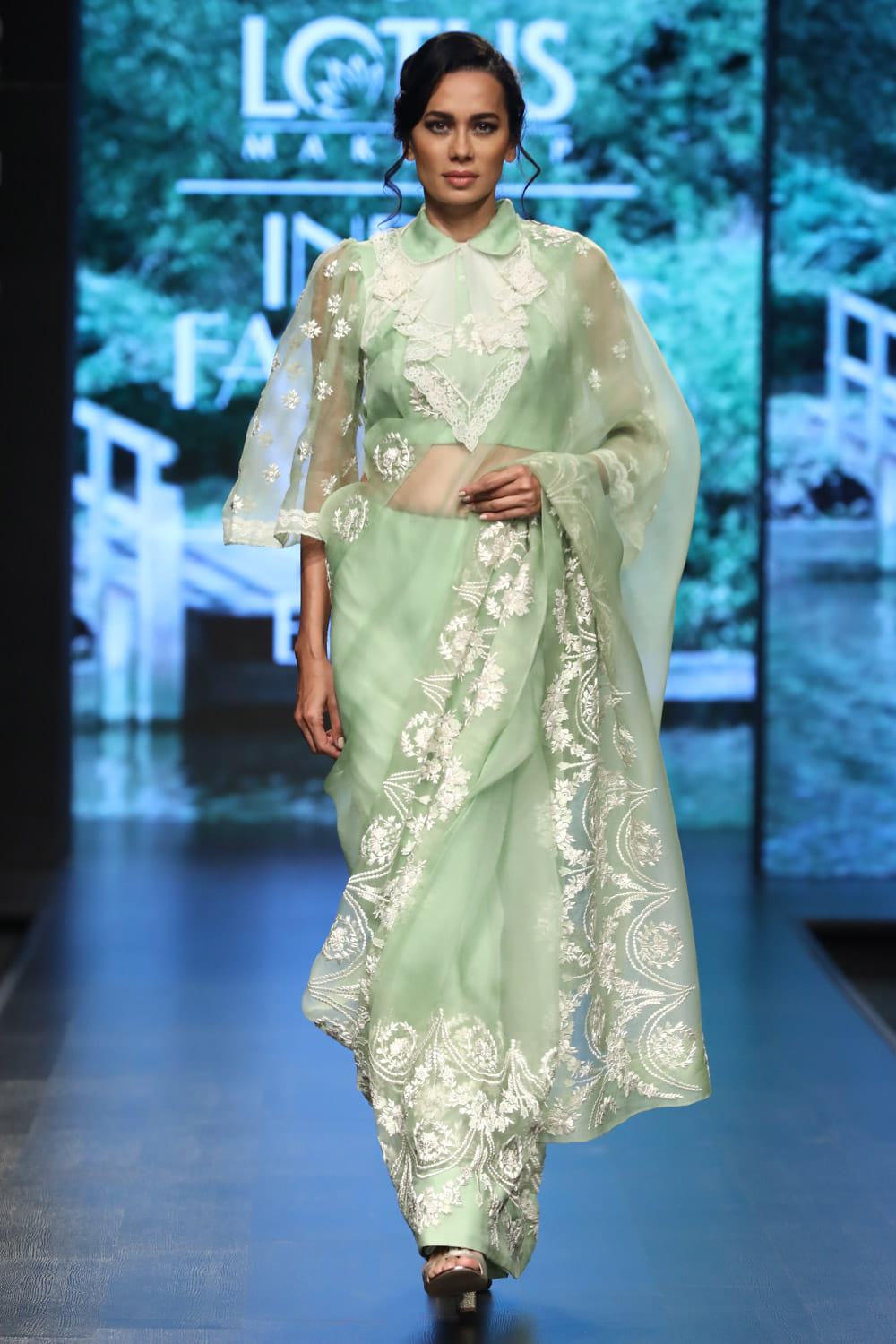 Mint green saree with blouse designed by Parul & Ashie at AASHNI+CO.