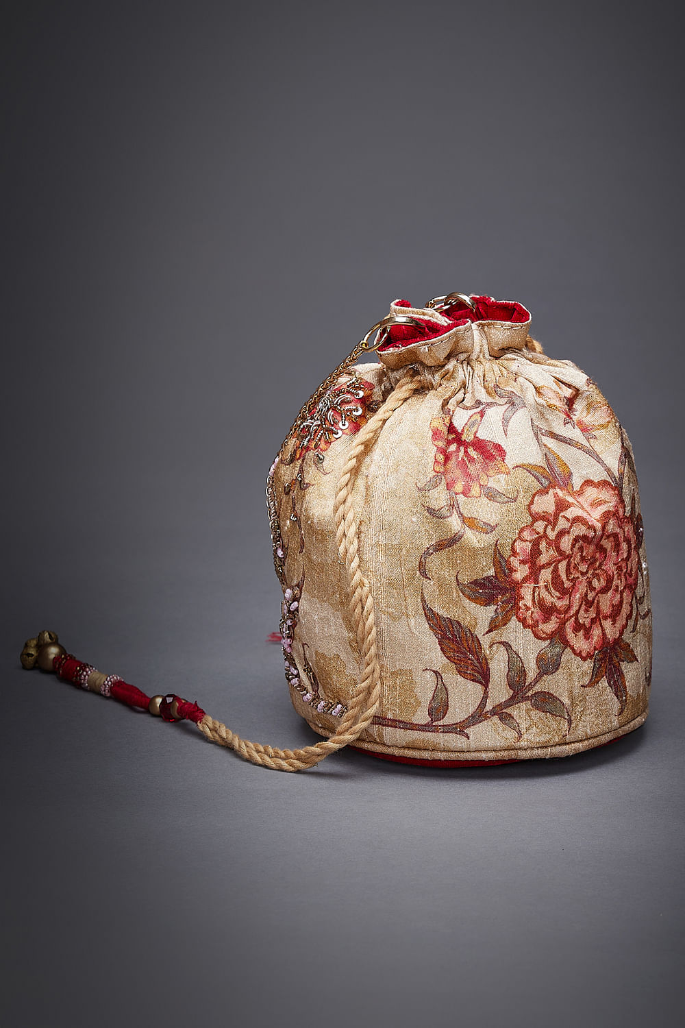 Buy Gold embroidered potli bag by Ritu Kumar at Aashni and Co