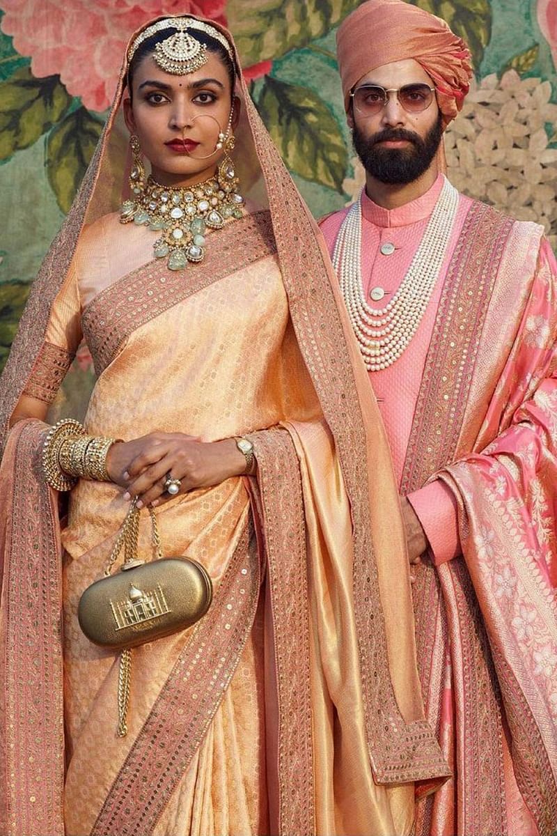 Sabyasachi gold clutch deals