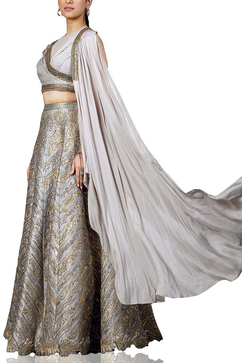 Kriti Sanon's white and gold Shantanu & Nikhil lehenga will stand out on  any celebratory occasion | VOGUE India