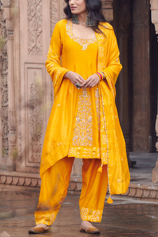 buy yellow asymmetrical embroidered kurta set by pink city by sarika 1