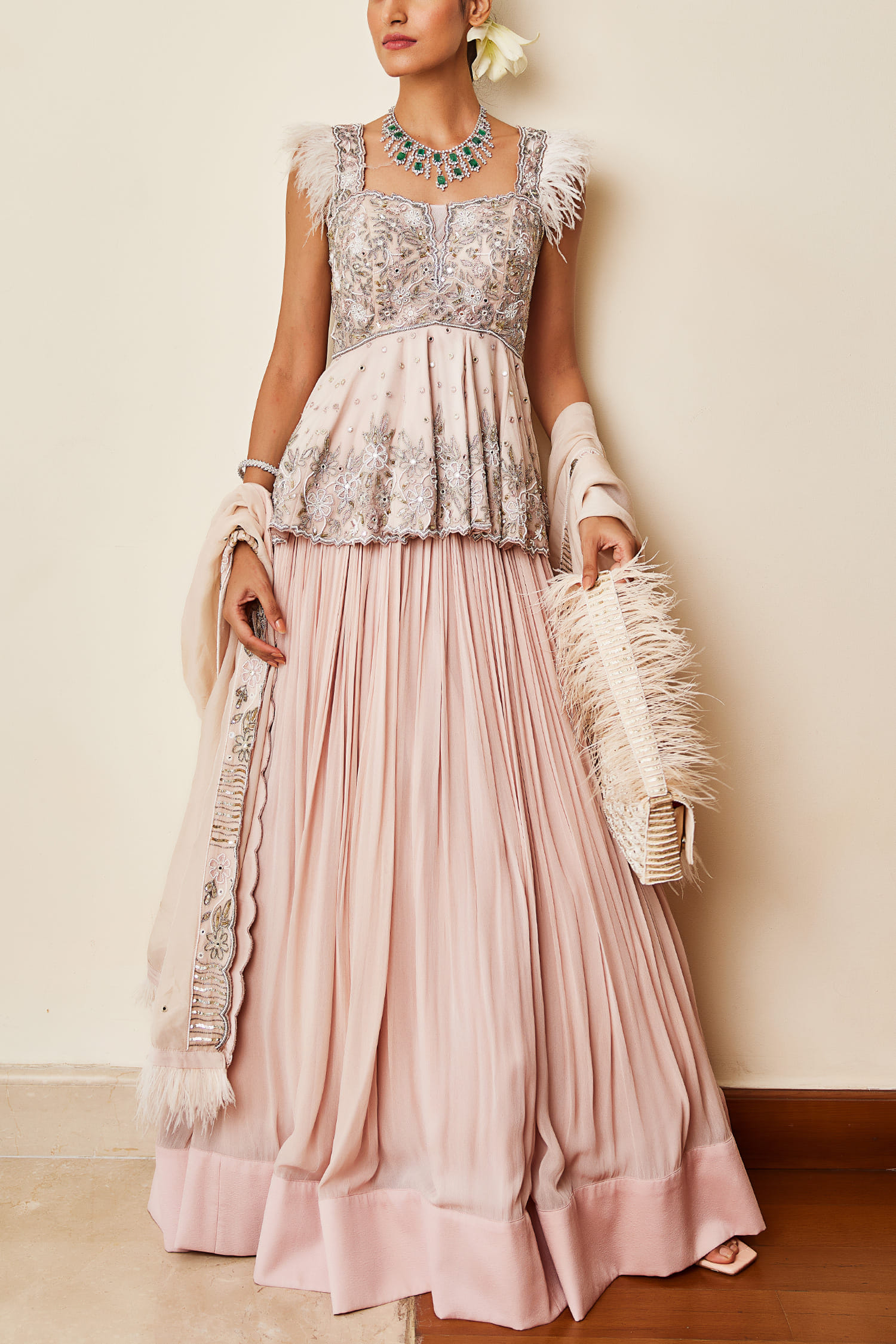 Buy Ivory embroidered peplum and lehenga set by Awigna at Aashni and Co