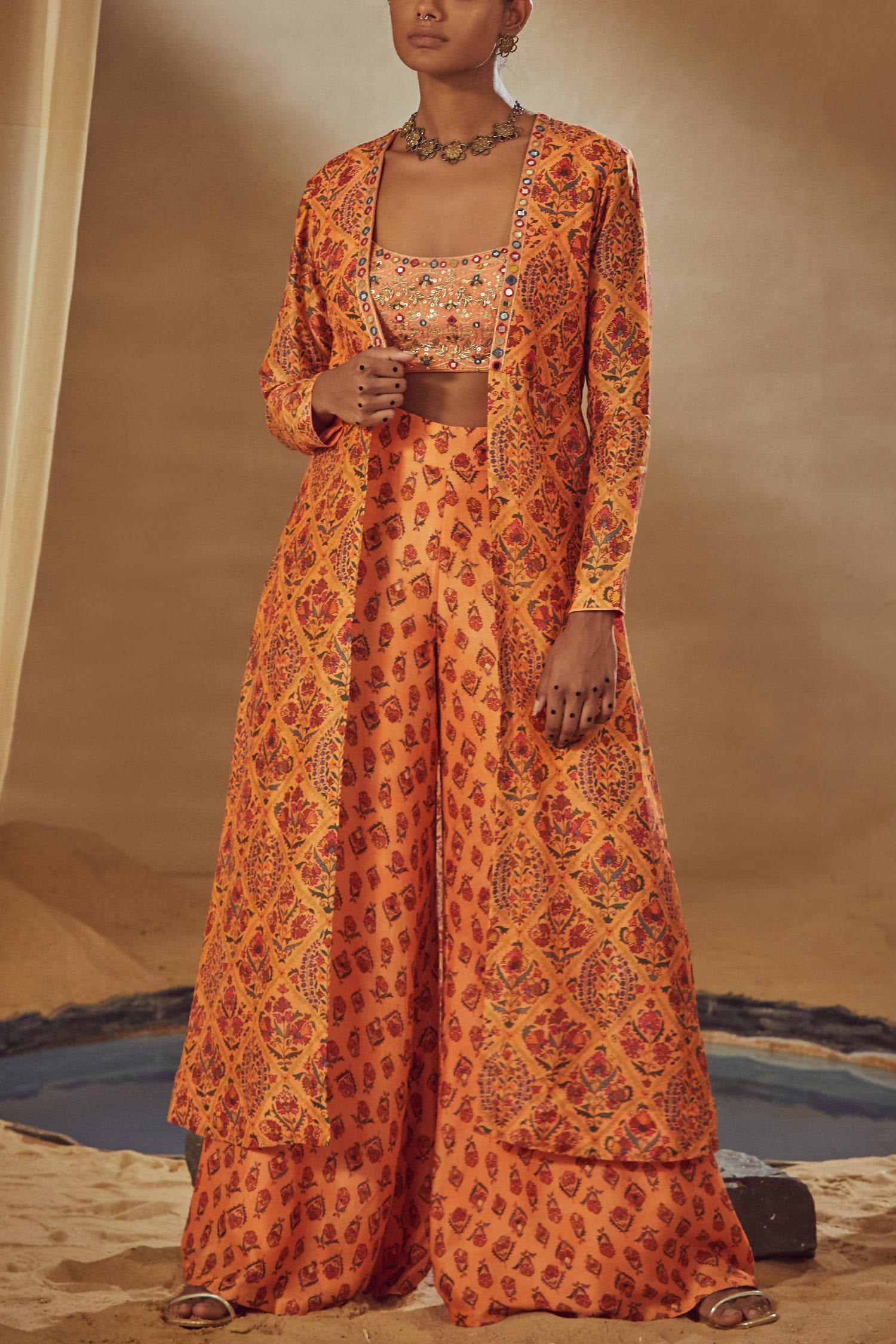 Multicoloured printed short cape designed by Saaksha & Kinni at AASHNI+CO.